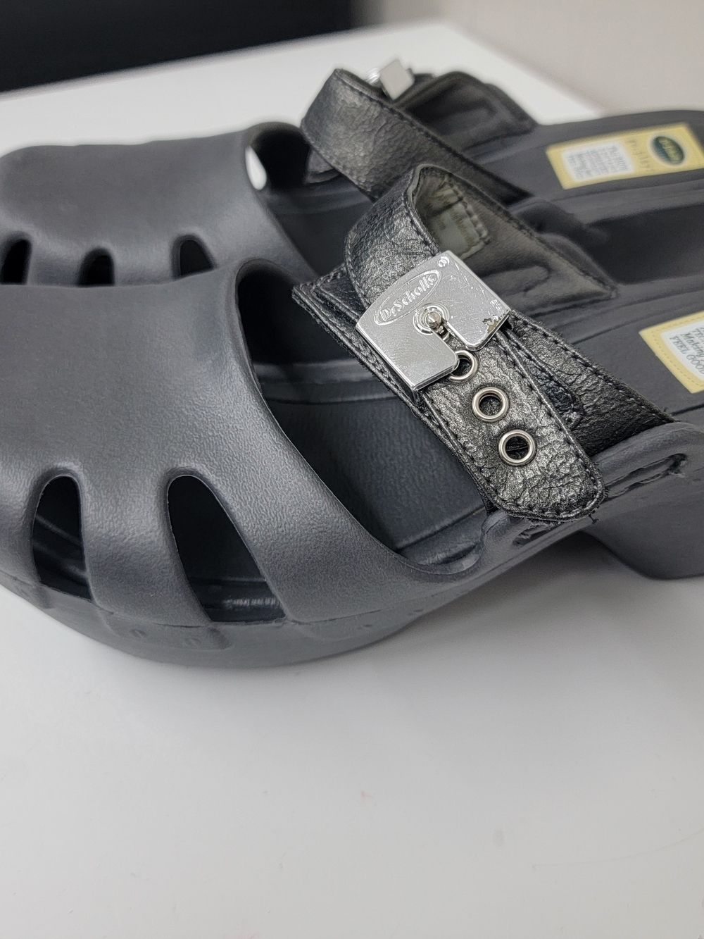 Dr. Scholl's Black Slip-On Clogs with Buckle Detail